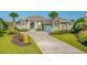 Stunning property with lush landscaping, a spacious driveway, and inviting curb appeal at 2000 Hideaway Point, Myrtle Beach, SC 29579