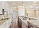 Open kitchen featuring granite countertops, a central island, and stainless steel appliances at 2000 Hideaway Point, Myrtle Beach, SC 29579