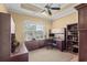 Office has a ceiling fan, built-in desk, and a window with natural light at 2000 Hideaway Point, Myrtle Beach, SC 29579
