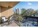 Balcony view of parking lot, trees, and building at 210 75Th Ave N # 4011, Myrtle Beach, SC 29572
