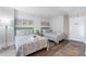 Two twin beds and beach-themed decor in a condo bedroom at 210 75Th Ave N # 4011, Myrtle Beach, SC 29572