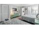 Two twin beds and a dresser; view into the kitchenette at 210 75Th Ave N # 4011, Myrtle Beach, SC 29572