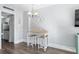 Small dining area with a table and three stools at 210 75Th Ave N # 4011, Myrtle Beach, SC 29572