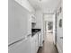 White cabinets, granite counters, and modern appliances at 210 75Th Ave N # 4011, Myrtle Beach, SC 29572