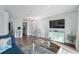 Living area with TV, sofa and decorative elements at 210 75Th Ave N # 4011, Myrtle Beach, SC 29572