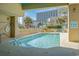 Community pool with surrounding patio furniture at 210 75Th Ave N # 4011, Myrtle Beach, SC 29572