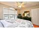 Bedroom with queen bed, ceiling fan, and window with blinds at 2102 Hawksmoor Dr., Conway, SC 29526