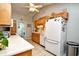 Well-equipped kitchen with light wood cabinets and white appliances at 2102 Hawksmoor Dr., Conway, SC 29526