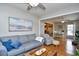 Living area with sectional sofa and view into the kitchen at 2102 Hawksmoor Dr., Conway, SC 29526