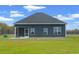 House exterior with a screened porch and large backyard at 216 William Nobles Rd., Aynor, SC 29511
