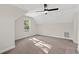 Spacious bedroom featuring a ceiling fan and large window at 216 William Nobles Rd., Aynor, SC 29511