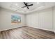 Spacious bedroom with hardwood floors, recessed lighting, and ceiling fan at 216 William Nobles Rd., Aynor, SC 29511