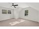 Bright bedroom with carpet, ceiling fan, and two windows at 216 William Nobles Rd., Aynor, SC 29511