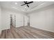 Large bedroom with hardwood floors and access to bathroom and another room at 216 William Nobles Rd., Aynor, SC 29511