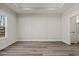 Bright bedroom with hardwood floors and neutral wall colors at 216 William Nobles Rd., Aynor, SC 29511