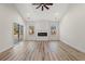 Spacious living room featuring a fireplace and sliding glass doors at 216 William Nobles Rd., Aynor, SC 29511