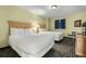 Bedroom with two double beds and a TV at 2201 Ocean Blvd. S # 1809, Myrtle Beach, SC 29577