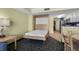 Bedroom with a wall bed and access to kitchen at 2201 Ocean Blvd. S # 1809, Myrtle Beach, SC 29577