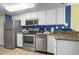 Modern kitchen featuring stainless steel appliances and granite countertops at 2201 Ocean Blvd. S # 1809, Myrtle Beach, SC 29577