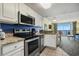Kitchen with granite countertops and stainless steel appliances at 2201 Ocean Blvd. S # 1809, Myrtle Beach, SC 29577