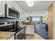 Kitchen with granite countertops and stainless steel appliances at 2201 Ocean Blvd. S # 1809, Myrtle Beach, SC 29577