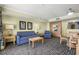 Living room with ocean view, sofa, chairs and dining table at 2201 Ocean Blvd. S # 1809, Myrtle Beach, SC 29577