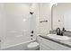 Clean bathroom with white vanity, granite countertop, and a shower/tub combo at 224 William Nobles Rd., Aynor, SC 29511