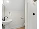 Modern bathroom with pedestal sink, shower, and updated fixtures at 224 William Nobles Rd., Aynor, SC 29511