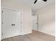 Spacious bedroom featuring double doors and hardwood floors at 224 William Nobles Rd., Aynor, SC 29511