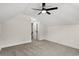 Spacious bedroom with ceiling fan and access to hallway at 224 William Nobles Rd., Aynor, SC 29511