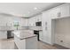 Modern kitchen with white cabinets, granite countertops, and an island at 224 William Nobles Rd., Aynor, SC 29511