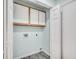 Laundry room with wooden cabinets and vinyl flooring at 227 Birdie Way, Longs, SC 29568