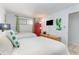 Guest bedroom with two twin beds, nightstands, and a red dresser at 2310 North Ocean Blvd. # 605, Myrtle Beach, SC 29577