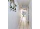 Bright hallway with tiled floor, leading to living area and other rooms at 2310 North Ocean Blvd. # 605, Myrtle Beach, SC 29577