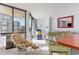 Bright living room with ocean view, comfy seating, and dining area at 2310 North Ocean Blvd. # 605, Myrtle Beach, SC 29577
