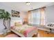 Cheerful bedroom featuring hardwood floors, colorful accents, and bright natural light at 234 Sugar Mill Loop, Myrtle Beach, SC 29588