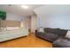 Comfortable bedroom with a plush bed, seating area, and hardwood floors at 234 Sugar Mill Loop, Myrtle Beach, SC 29588