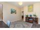 Lovely decorated bedroom featuring a light fixture, plants and a painting at 234 Sugar Mill Loop, Myrtle Beach, SC 29588