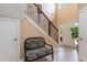 Spacious foyer with two-story ceiling, decorative chair and tile flooring at 234 Sugar Mill Loop, Myrtle Beach, SC 29588