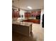 Well-lit kitchen featuring granite countertops, wooden cabinetry, and modern appliances at 234 Sugar Mill Loop, Myrtle Beach, SC 29588