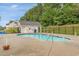 Community pool featuring well-maintained landscaping and secure fencing at 234 Sugar Mill Loop, Myrtle Beach, SC 29588