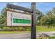 Community sign that reads 'Sugar Mill Plantation' with beautiful landscaping at 234 Sugar Mill Loop, Myrtle Beach, SC 29588