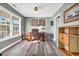 Home office with large window, built-in shelving, and a comfortable desk chair at 281 Sugar Mill Loop, Myrtle Beach, SC 29588