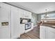 White kitchen with stainless steel appliances and ample counter space at 281 Sugar Mill Loop, Myrtle Beach, SC 29588