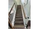 Modern staircase with wood and white railings at 281 Sugar Mill Loop, Myrtle Beach, SC 29588