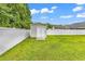 Spacious backyard with a shed and a white privacy fence at 290 Georgia Mae Loop, Conway, SC 29527