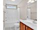 A clean bathroom featuring a combination shower and tub, a tiled floor, and a vanity at 290 Georgia Mae Loop, Conway, SC 29527