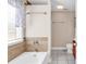 A cozy bathroom features a combination shower and tub with tiled backsplash at 290 Georgia Mae Loop, Conway, SC 29527