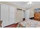 Bedroom with double closet and wood floors at 290 Georgia Mae Loop, Conway, SC 29527