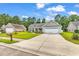 Charming single-story home with a well-manicured lawn and a two-car garage at 290 Georgia Mae Loop, Conway, SC 29527